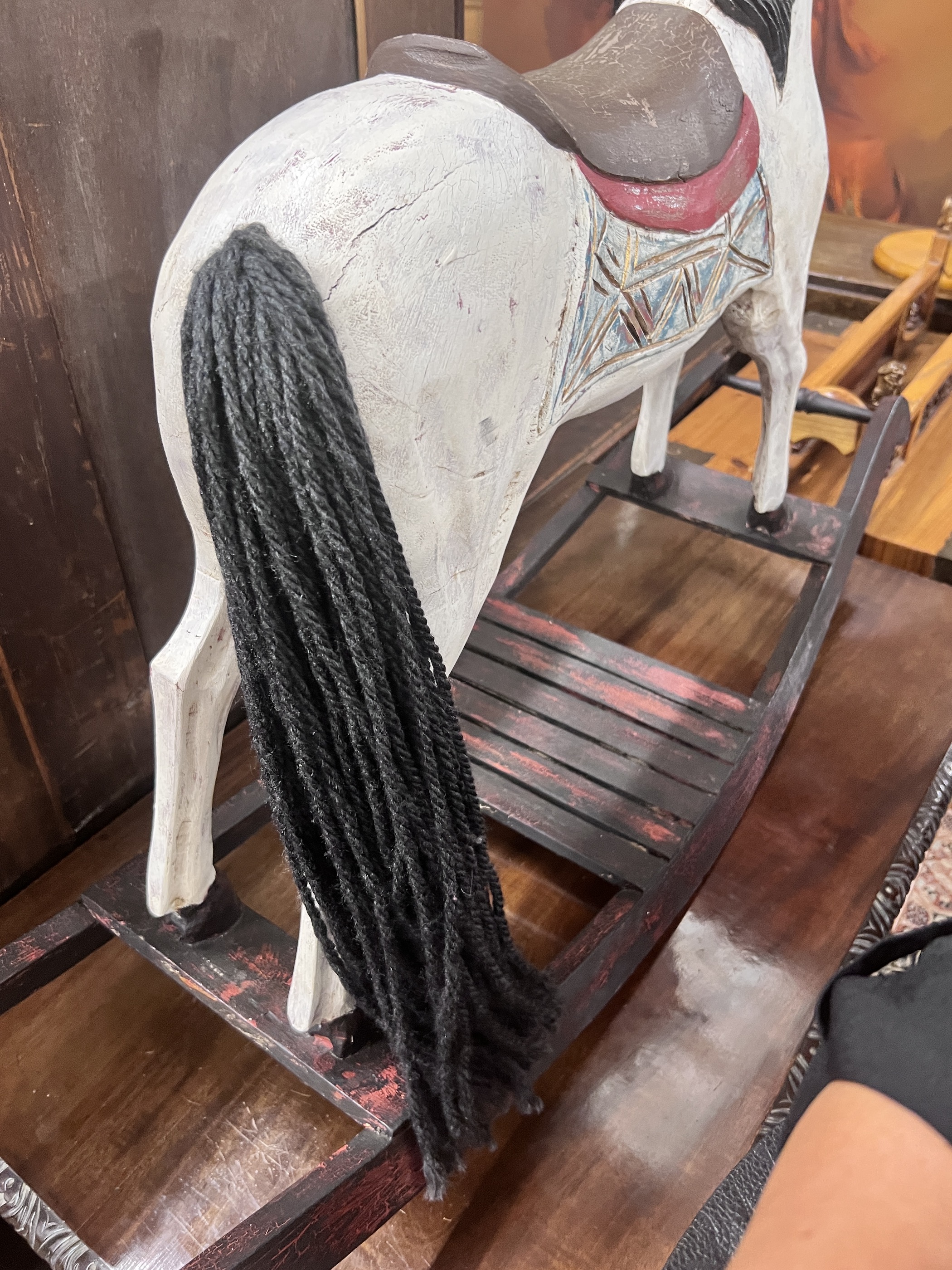 A Victorian style painted hardwood rocking horse, height 80cm